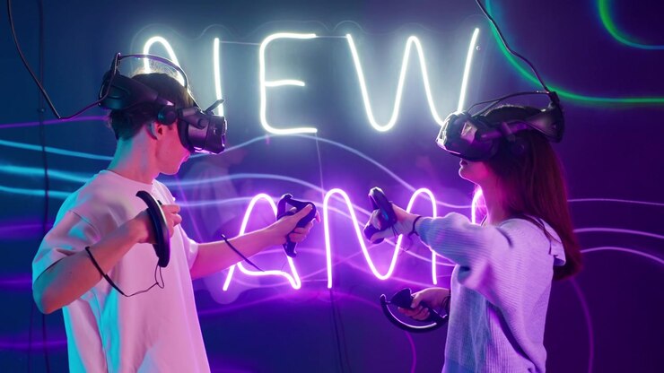 Young Couple Playing Virtual Reality Game with Neon Lights