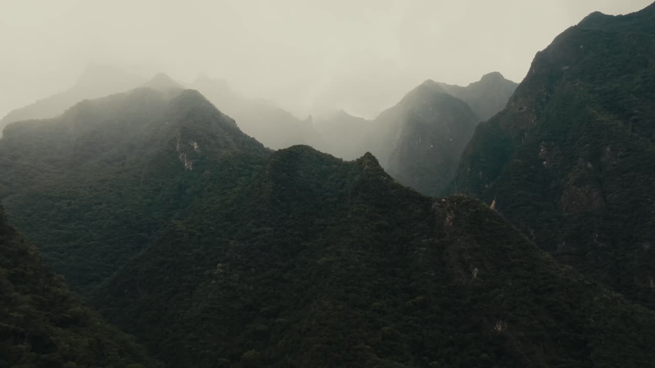 Rugged Peaks Of Machu Picchu Mountain At Dawn Near Cuzco, Peru. Aerial Shot