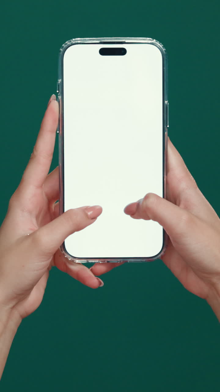 Hands Interacting with Blank Smartphone Screen on Green Background ...