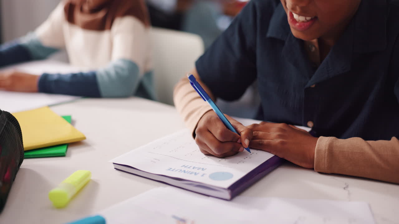 Child Working on Math Exercise in Classroom