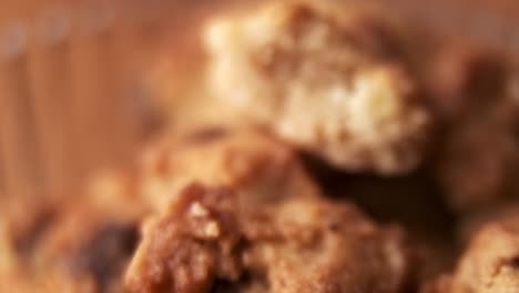 closeup macro shot of chocolate chip cookies in bowl, dolly in