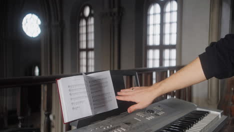 playing piano in a church