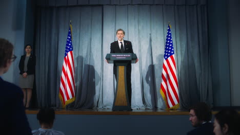 president of usa answers journalists questions and gives interview. confident american republican politician delivers successful speech to supporters at press conference. backdrop with american flags.