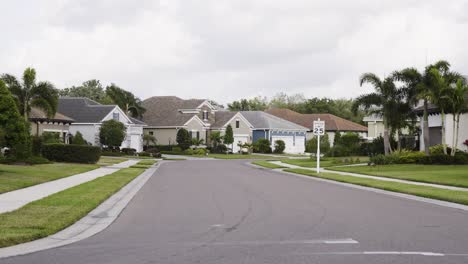 Tropical-neighborhood-road-on-a-warm-cloudy-day