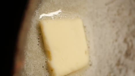 melting butter in a pan
