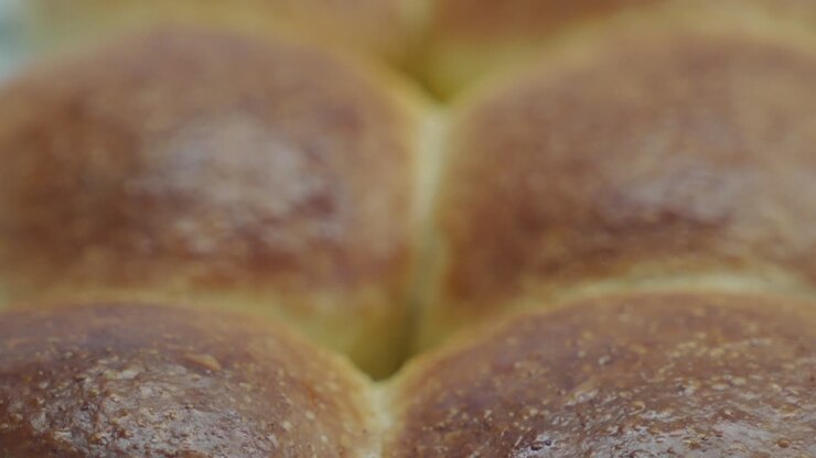 Homemade round-shaped soft buns dinner rolls baked in an oven