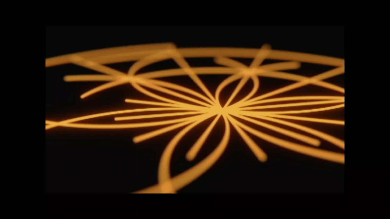 Leuchtend orangefarbenes geometrisches Muster, das sich auf schwarzem Hintergrund bildet