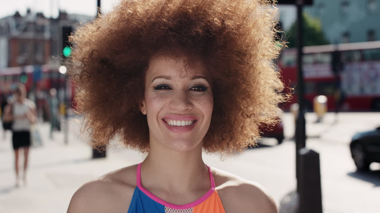 Slow Motion Portrait of funky happy mixed race woman smiling