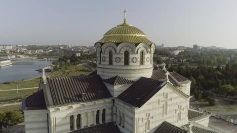 aerial view of a beautiful orthodox church in a coastal city