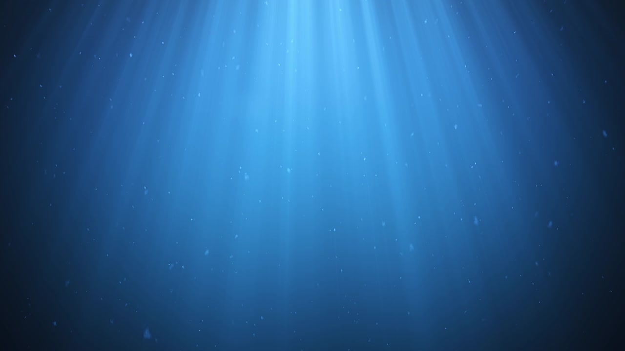 Rays of sunlight shining from above penetrate deep clear blue water. Sun light beams underwater. Small bubbles move up, under the water surface. Seamless Loop-able 3D Animation. 4K