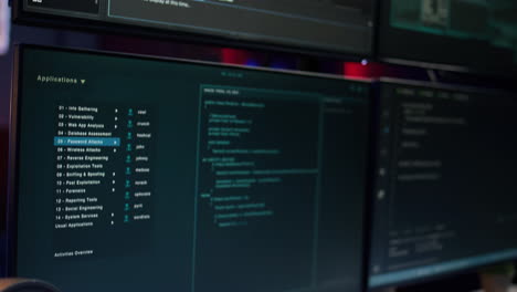 Extreme-close-up-of-software-interface-on-PC-screens-showing-lines-of-code