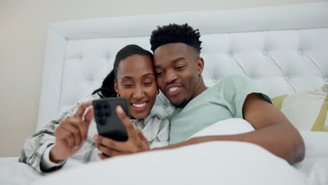 Phone,-social-media-and-a-black-couple-in-bed