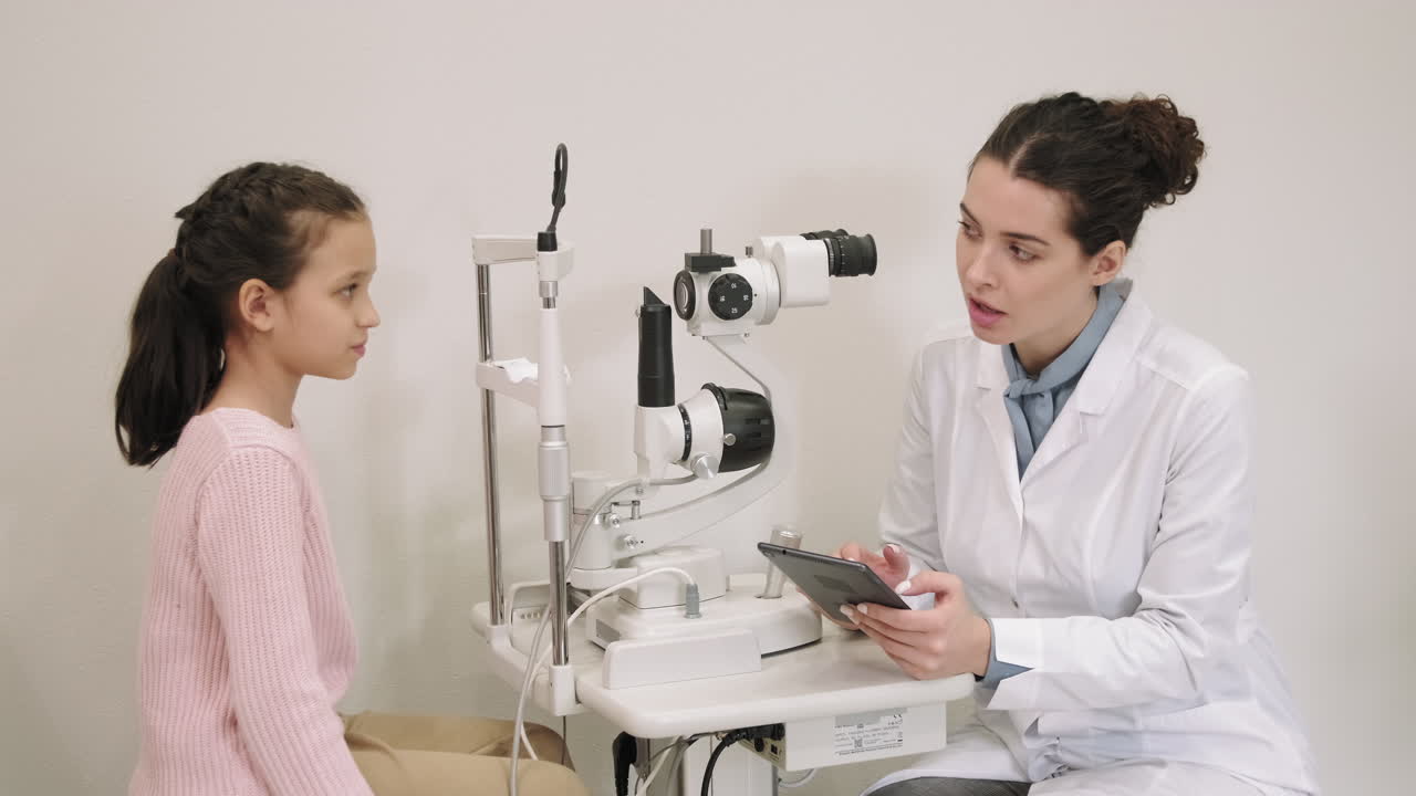 Little Girl At Ophthalmologist Appointment