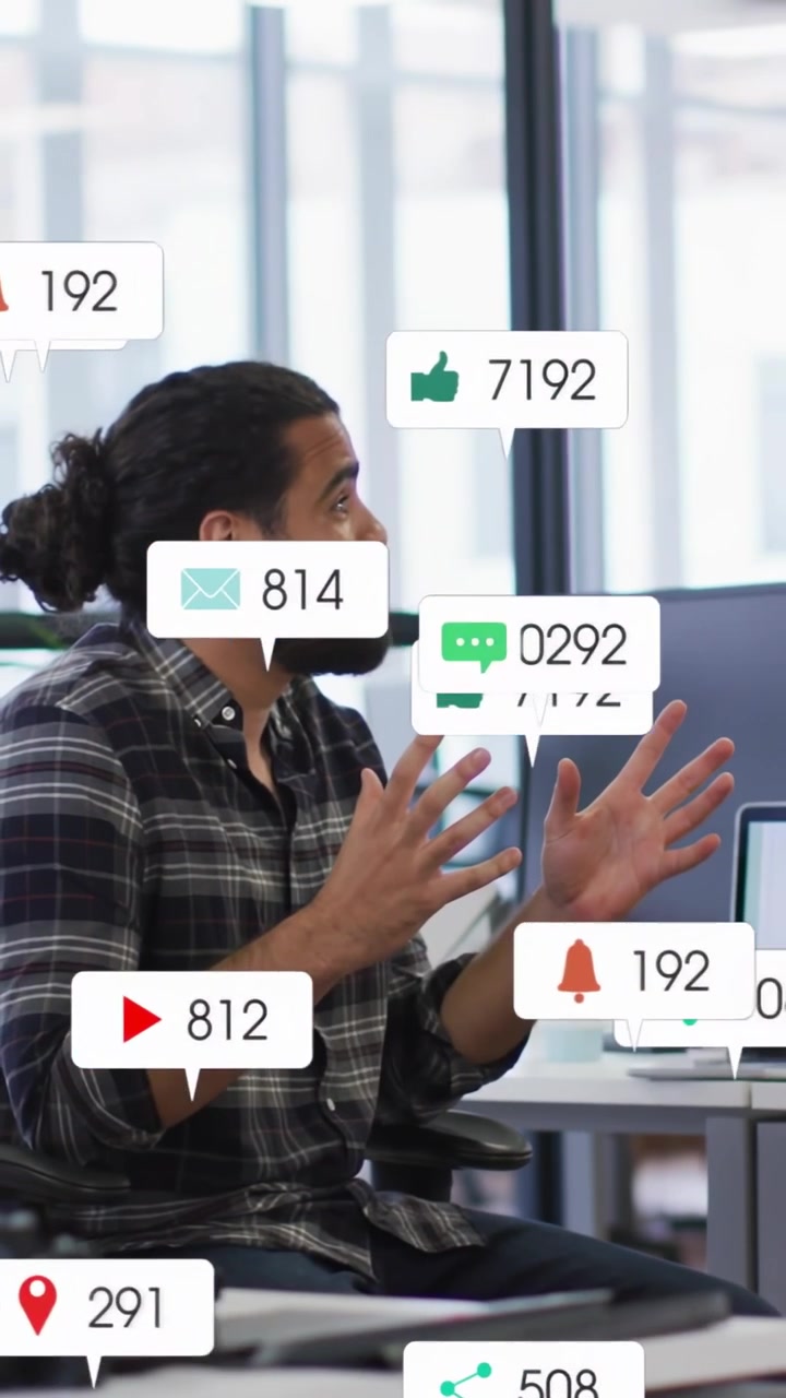 Vertical video: Man talking, causing social bubbles to gather around hands, showing marketing lift