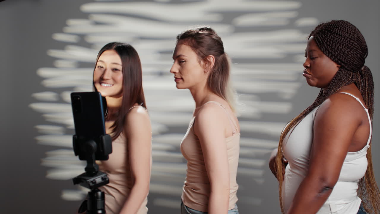Group of Diverse Women Dancing and Recording Video
