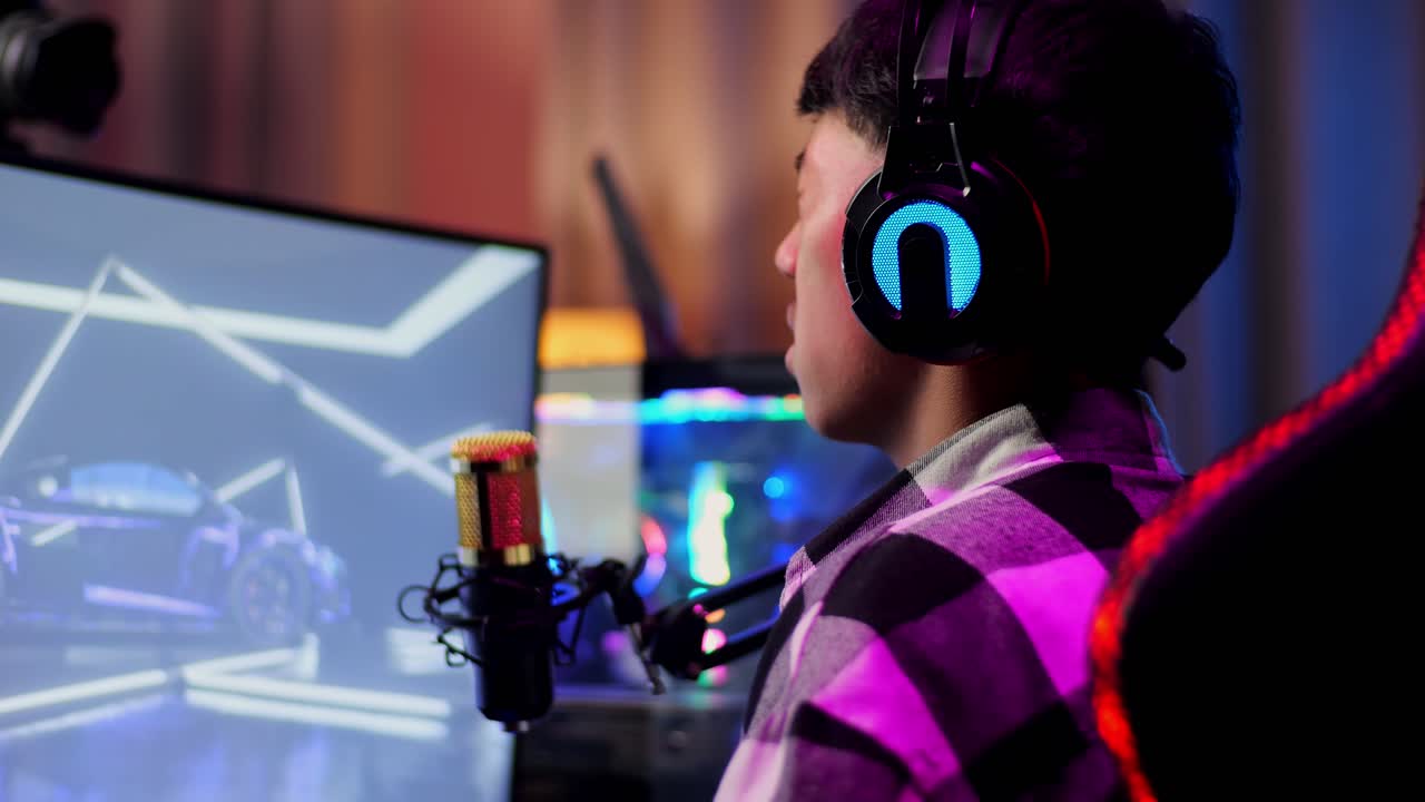 Close Up Back View Of Asian Boy Streamer Having A Backache While ...