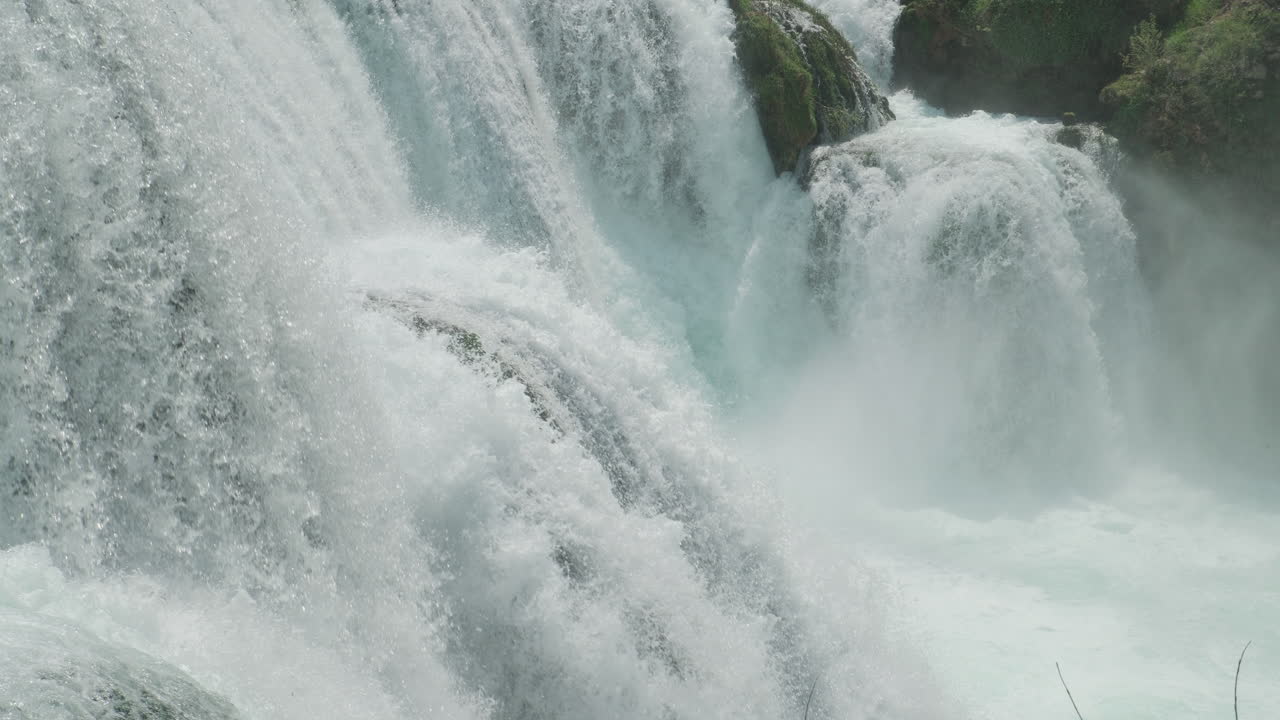 A waterfall of a pure wild river located in a green rainforest
