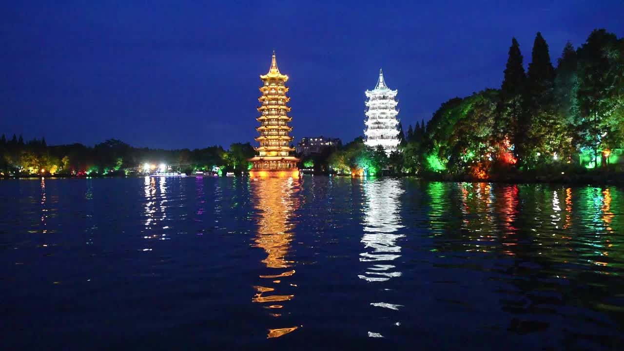 The Sun and Moon Pagodas on Shan Hu Lake in Guilin, Guangxi, China, are iconic twin towers and popular tourist attractions, together forming one of the city’s most famous cultural landmarks