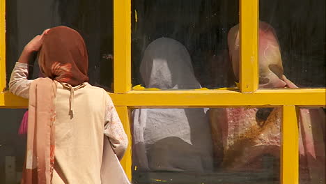 girls look into a classroom in kabul afghanistan