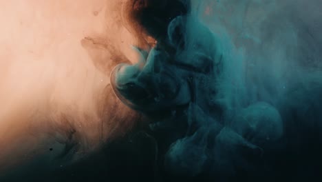 mix color ink spread in water with gloomy background
