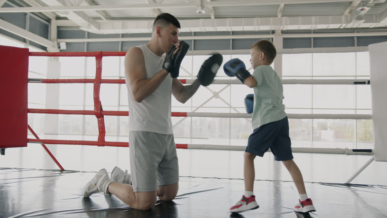 Boxing Training Session of a Father and Son