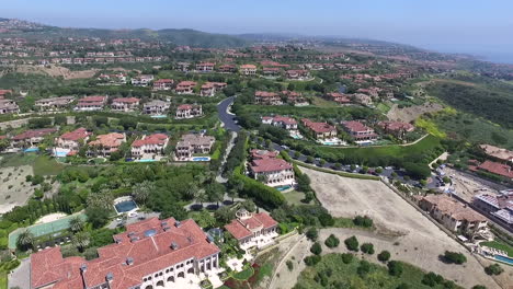 aerial drone footage of luxury homes over pelican hill in newport beach, orange county, california