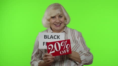 Elderly-happy-grandmother-showing-Black-Friday-and-20-Percent-Off-discount-advertisement-banners