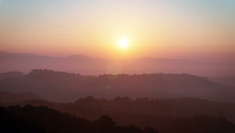 sunset time lapse over hills and mountains