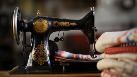 vintage sewing machine with textiles