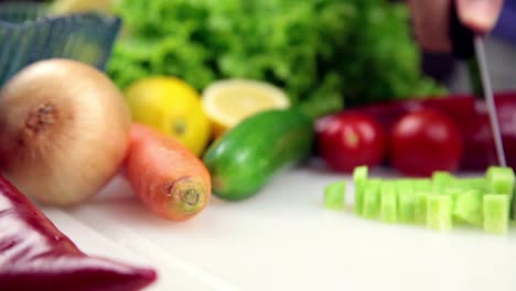 man making salad in kitchen 9