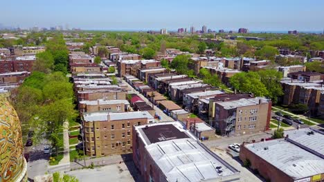 beautiful aerial around a moorish dome and lower class neighborhoods on the southside of chicago 1