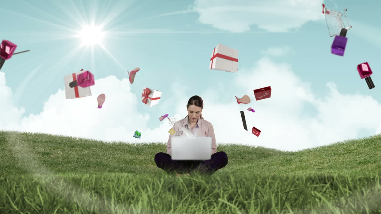 한 여성이 노트북에서 전자 쇼핑 제안을 보고 있습니다.