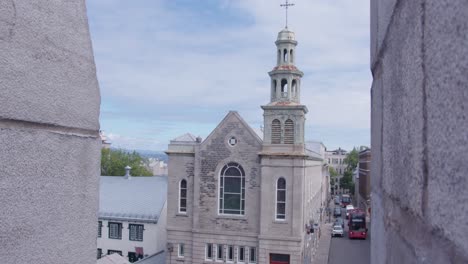 wide slow motion pan left of the jesuit chapel in quebec city canada