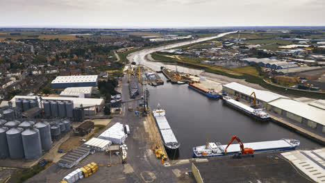 Breathtaking-aerial-drone-footage-displays-Boston,-Lincolnshire:-Port,-ships,-Saint-Botolph-Church-,-Saint-Botolph’s-Bridge