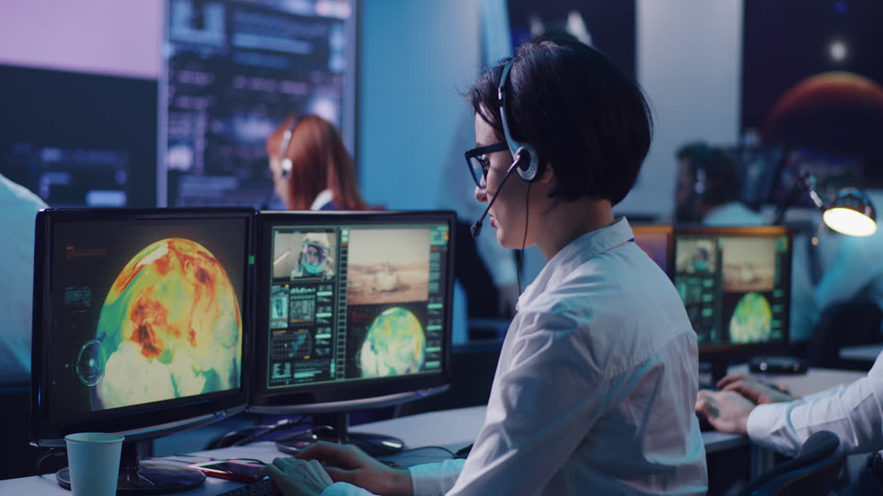 Space Mission Control Team Monitoring Data