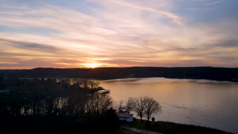 Peaceful-Serene-Nature-Sunset-of-Lake-in-Missouri,-Aerial-Slow-Panning