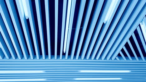 walking under the plank ceiling with long led lamps. switched on white light illumination. view from below.