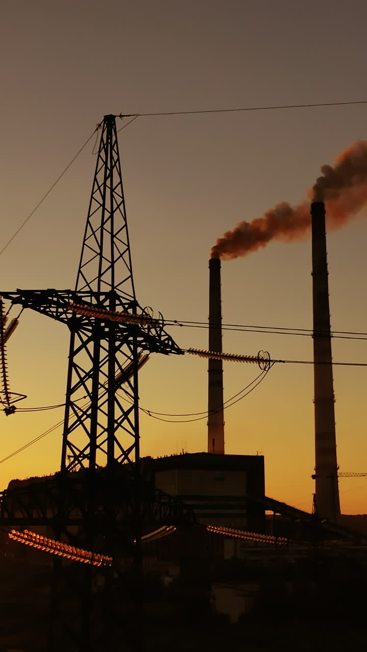 Electricity pylons and lines. Silhouette of high voltage power lines