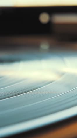 close-up of a vinyl record on a turntable