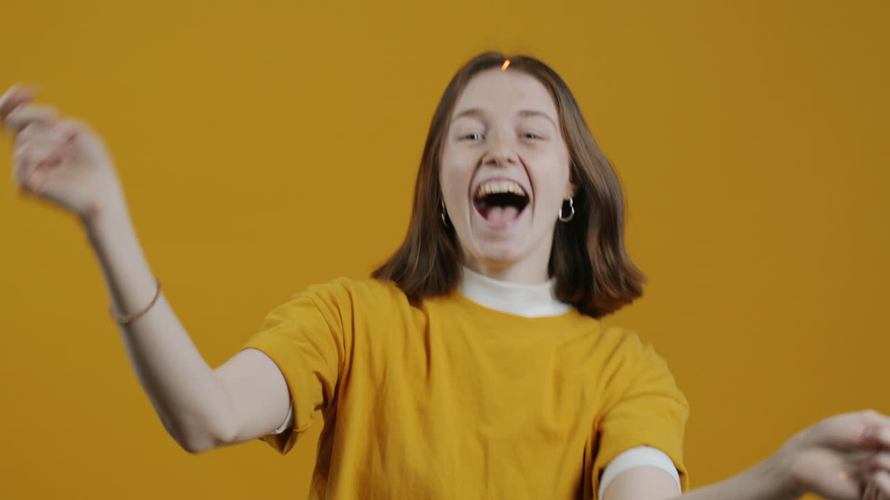 Happy Woman with Sparklers