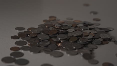 Change-of-American-Currency-and-Coins-in-a-large-pile