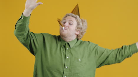 Man Celebrating with Party Hat