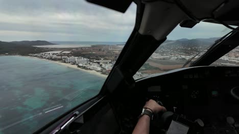 Pilot-FPV-POV-arriving-to-Ibiza-airport,-Spain,-overflying-the-coastline