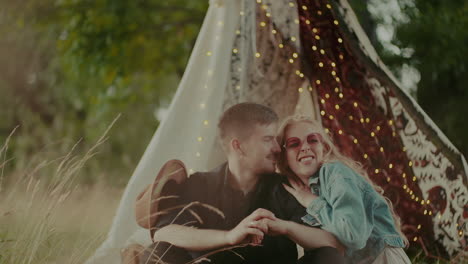 Couple-Laughing-And-Smiling-While-Embracing-Outdoors