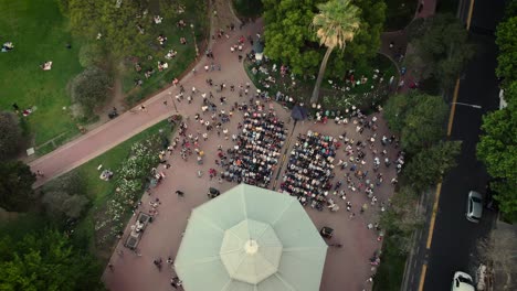 Spectators-attend-entertainment-event-at-La-Glorieta,-Barrancas-de-Belgrano-Park,-Buenos-Aires