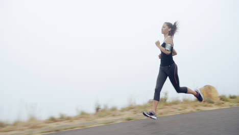 woman-running-on-road-close-up-shoes-steadicam-shot