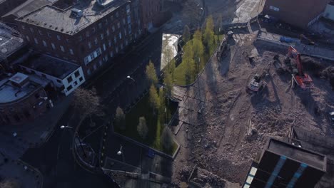 demolished multi storey car park concrete construction debris in town regeneration aerial view demolition