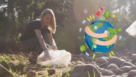 animation of hugging globe over happy caucasian woman picking up rubbish in countryside