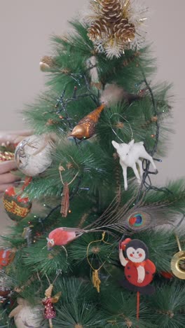 a close-up of a beautifully decorated christmas tree with various ornaments and lights