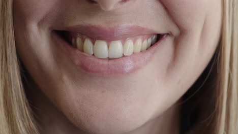 close up woman mouth smiling happy showing healthy white teeth dental health concept